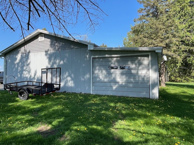 view of side of home featuring a yard