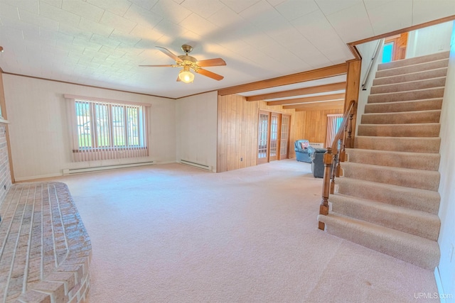 536 N W Gulliver Lake Rd, Gulliver, MI 49840 - unfurnished living room with baseboard heating, healthy amount of natural light, stairway, wooden walls, and beamed ceiling