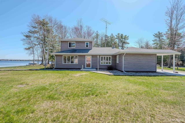 536 N W Gulliver Lake Rd, Gulliver, MI 49840 - view of front of home with a front lawn and a water view