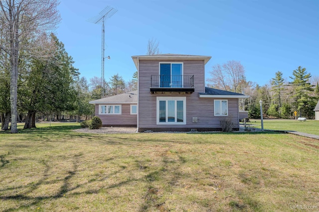 536 N W Gulliver Lake Rd, Gulliver, MI 49840 - back of house featuring a yard