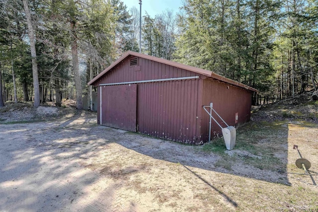 536 N W Gulliver Lake Rd, Gulliver, MI 49840 - view of pole building featuring a view of trees