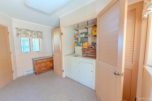 536 N W Gulliver Lake Rd, Gulliver, MI 49840 - laundry area featuring washing machine and clothes dryer, light carpet, crown molding, and a baseboard radiator