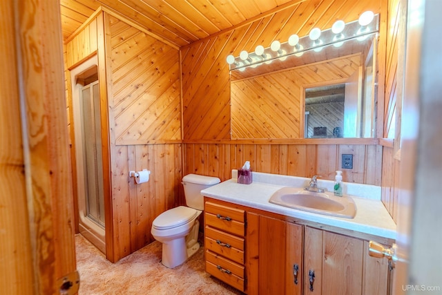536 N W Gulliver Lake Rd, Gulliver, MI 49840 - bathroom with wooden walls, a shower stall, vanity, and toilet