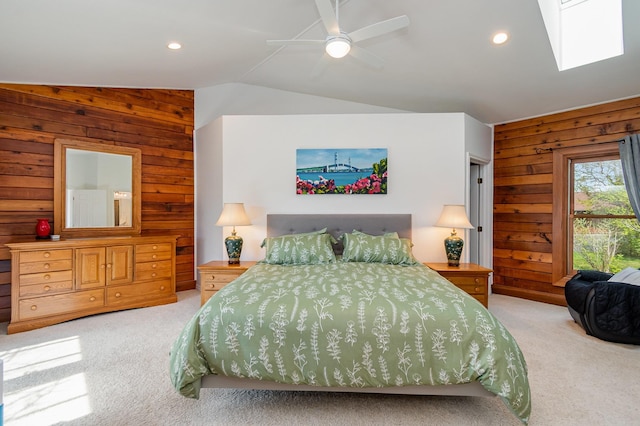 bedroom with carpet floors, wooden walls, lofted ceiling, recessed lighting, and a ceiling fan