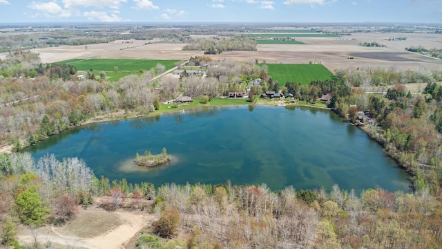 aerial overview of property's location with a nearby body of water and rural landscape