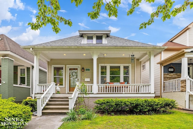 1117 Lakepointe St, Grosse Pointe Park, MI 48230 - bungalow-style home featuring a porch and roof with shingles