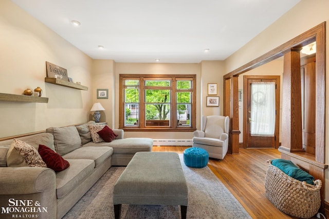1117 Lakepointe St, Grosse Pointe Park, MI 48230 - living room featuring baseboard heating and wood finished floors