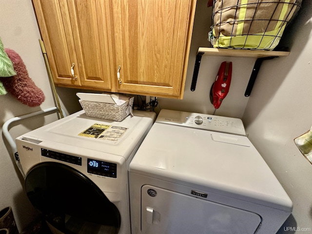 39 Stonegate Hts, Marquette, MI 49855 - laundry room with washer and dryer and cabinet space