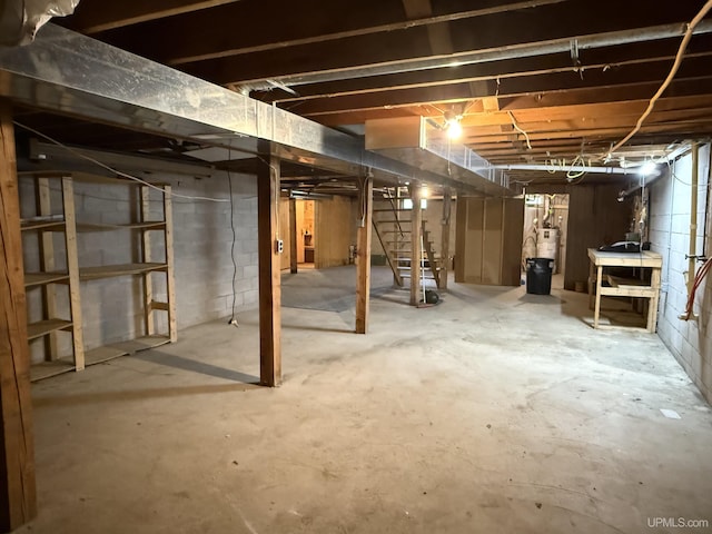 39 Stonegate Hts, Marquette, MI 49855 - unfinished below grade area featuring water heater and stairs