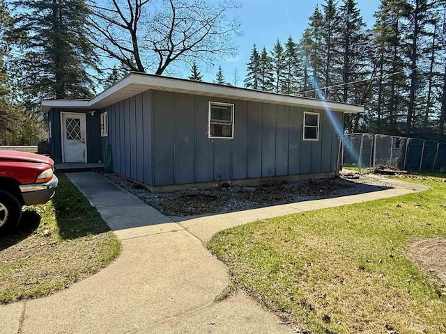 8741 0.8 Ln, Gladstone, MI 49837 - view of home's exterior with board and batten siding