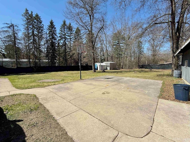 8741 0.8 Ln, Gladstone, MI 49837 - view of green lawn with a storage shed and an outdoor structure
