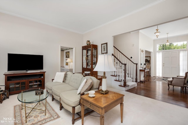 683 Morningside Ln, Grosse Pointe Woods, MI 48236 - living area featuring crown molding, stairway, carpet floors, and wood finished floors
