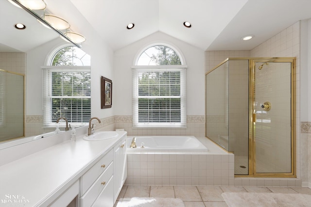 683 Morningside Ln, Grosse Pointe Woods, MI 48236 - full bath with lofted ceiling, plenty of natural light, a stall shower, a bath, and vanity