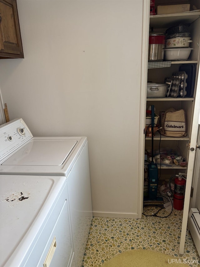 303 Jonathon Carver Rd, Marquette, MI 49855 - washroom with independent washer and dryer, cabinet space, and baseboard heating