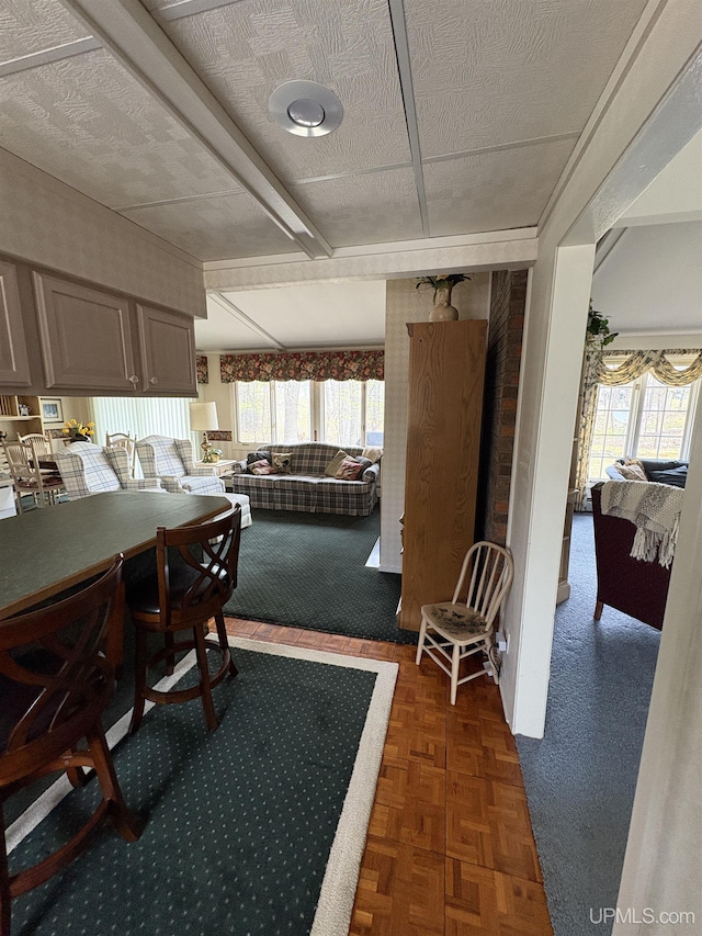 303 Jonathon Carver Rd, Marquette, MI 49855 - dining room with beamed ceiling
