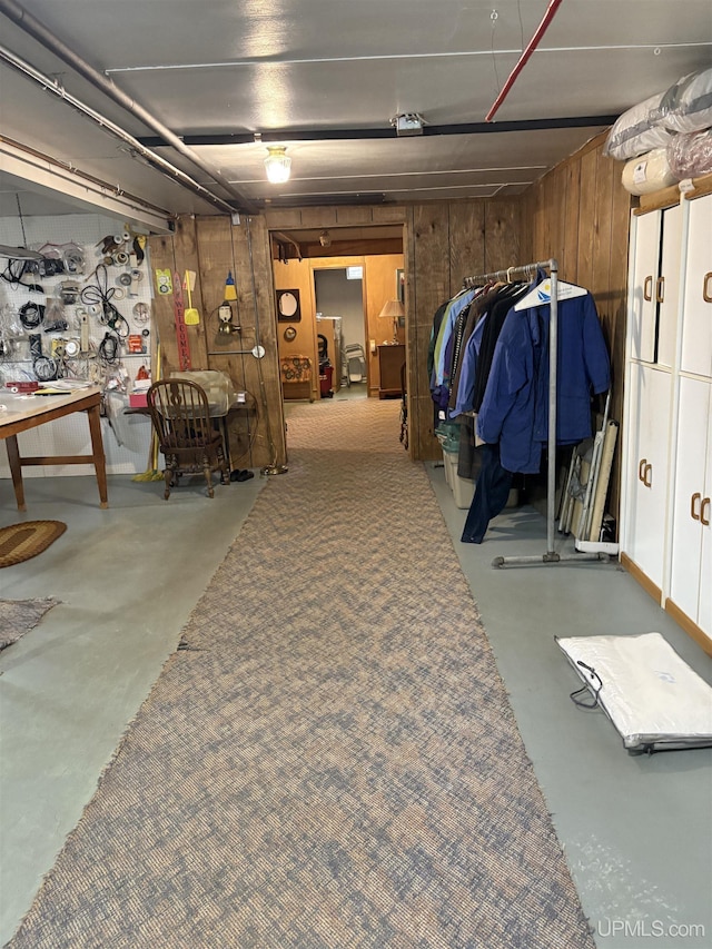 303 Jonathon Carver Rd, Marquette, MI 49855 - below grade area featuring wood walls