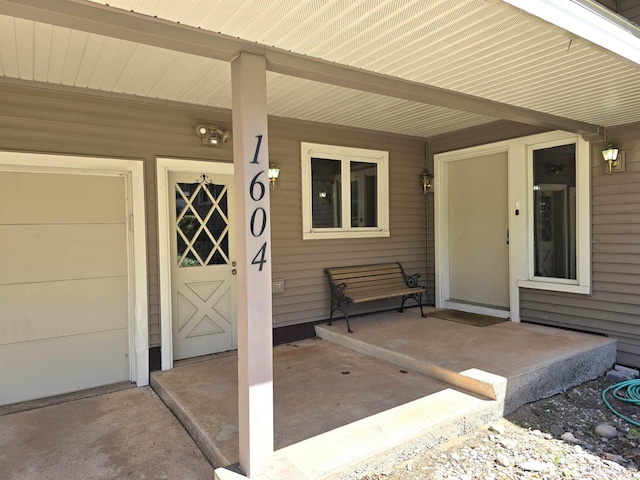 1604 Mildred Ave, Marquette, MI 49855 - doorway to property with covered porch