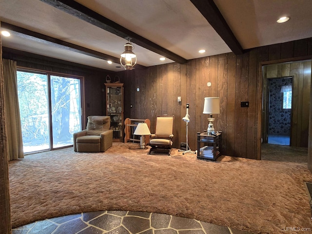 1604 Mildred Ave, Marquette, MI 49855 - living area with carpet flooring, beam ceiling, wood walls, recessed lighting, and a chandelier
