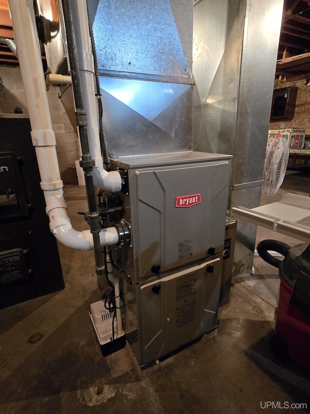 1604 Mildred Ave, Marquette, MI 49855 - utility room featuring heating unit