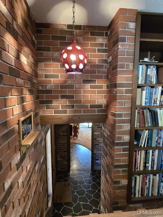 1604 Mildred Ave, Marquette, MI 49855 - hall with brick wall