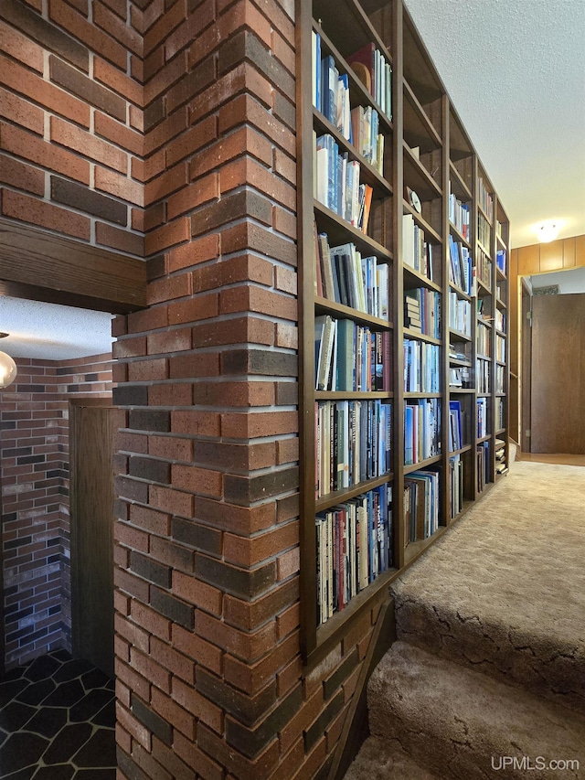 1604 Mildred Ave, Marquette, MI 49855 - detailed view of a textured ceiling and brick wall