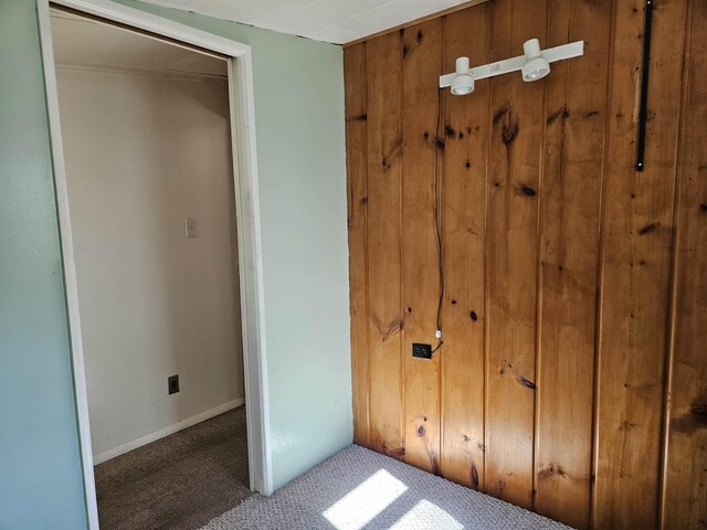 5440 Custer Dr, Harrison, MI 48625 - unfurnished bedroom featuring carpet floors and baseboards