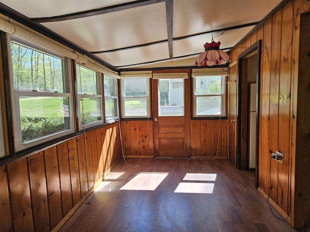 5440 Custer Dr, Harrison, MI 48625 - unfurnished sunroom with healthy amount of natural light, wood finished floors, and wood walls