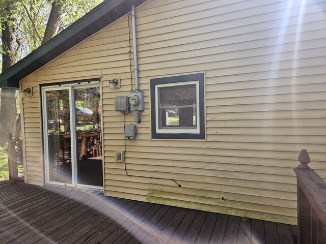 5440 Custer Dr, Harrison, MI 48625 - view of side of home with a deck