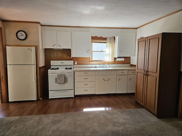 5440 Custer Dr, Harrison, MI 48625 - kitchen featuring white appliances, ornamental molding, a sink, white cabinets, and light countertops
