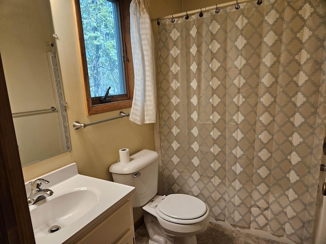 5440 Custer Dr, Harrison, MI 48625 - bathroom featuring vanity, toilet, and a shower with curtain
