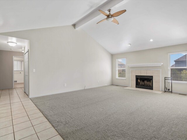55374 Raspberry Dr, Macomb Twp, MI 48042 - unfurnished living room with a ceiling fan, light carpet, light tile patterned floors, and healthy amount of natural light