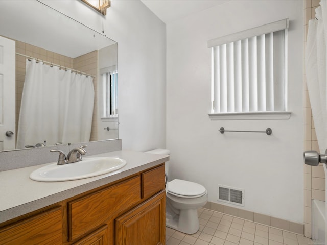 55374 Raspberry Dr, Macomb Twp, MI 48042 - bathroom with tile patterned floors, toilet, a shower with shower curtain, vanity, and a tub to relax in
