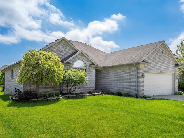 55374 Raspberry Dr, Macomb Twp, MI 48042 - ranch-style house with an attached garage, brick siding, a front lawn, and concrete driveway