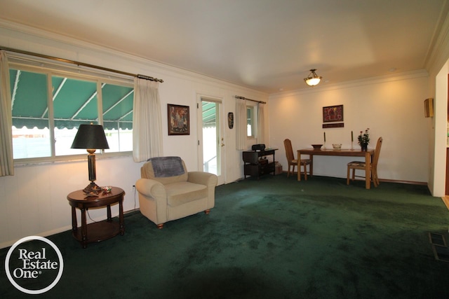 carpeted living area with crown molding