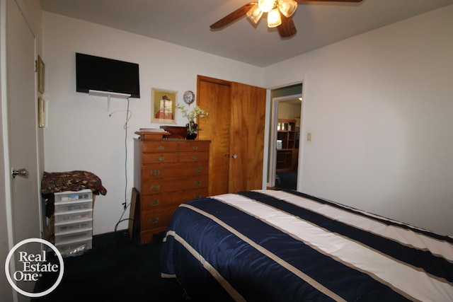 bedroom with ceiling fan and carpet floors