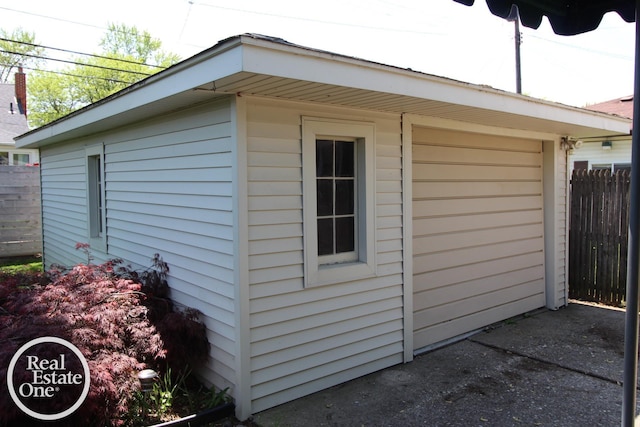 view of outdoor structure with fence