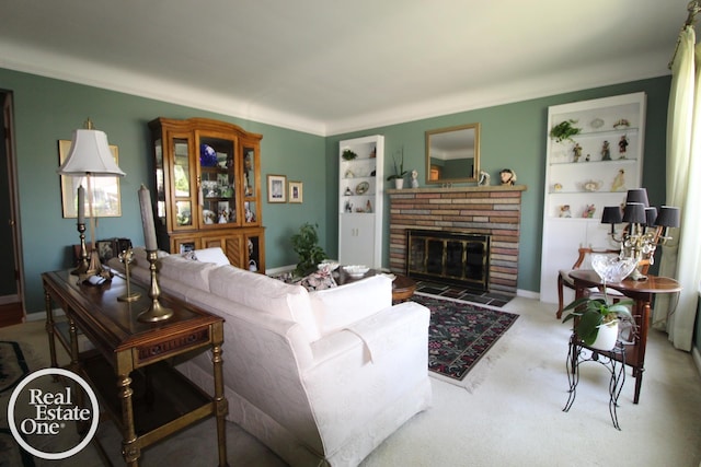 living room featuring a brick fireplace, crown molding, built in features, and carpet