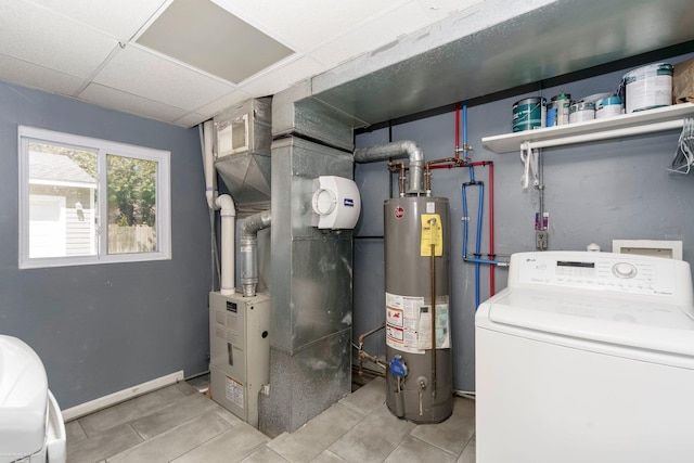utilities with washer / clothes dryer, gas water heater, and heating unit