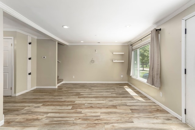 spare room with stairs, recessed lighting, baseboards, light wood-type flooring, and crown molding