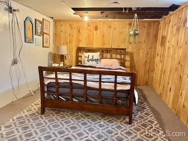 624 S 16th St, Escanaba, MI 49829 - carpeted bedroom with wood walls