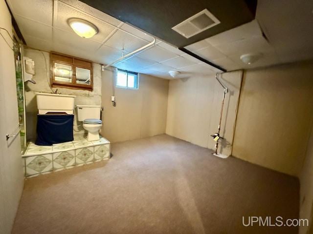 624 S 16th St, Escanaba, MI 49829 - below grade area featuring carpet flooring and a drop ceiling