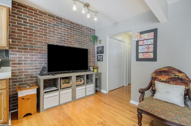 34485 Garfield Rd Apt # 1, Fraser, MI 48026 - sitting room with light wood finished floors and baseboards
