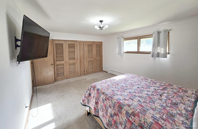 1400 W B St, Iron Mountain, MI 49801 - carpeted bedroom with a baseboard heating unit and a closet