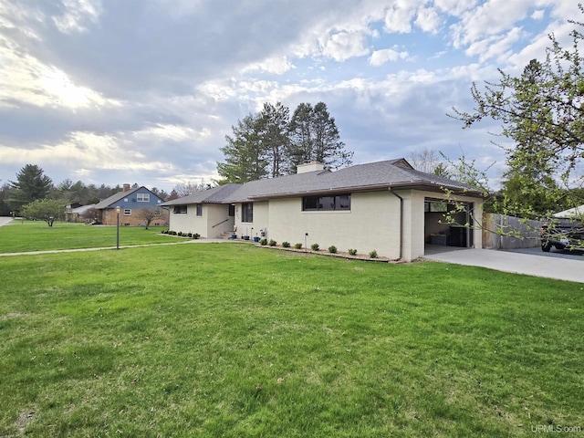 1400 W B St, Iron Mountain, MI 49801 - single story home with driveway, a front yard, and a chimney