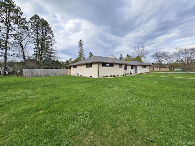 1400 W B St, Iron Mountain, MI 49801 - view of property exterior featuring a chimney