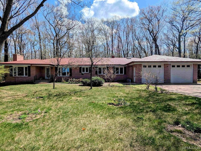 1002 Allouez Rd, Marquette, MI 49855 - ranch-style home featuring a chimney, an attached garage, and brick siding