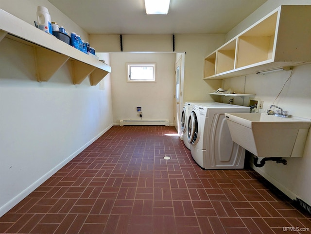 1002 Allouez Rd, Marquette, MI 49855 - laundry room with a baseboard heating unit, brick patterned flooring, washer and dryer, and baseboards