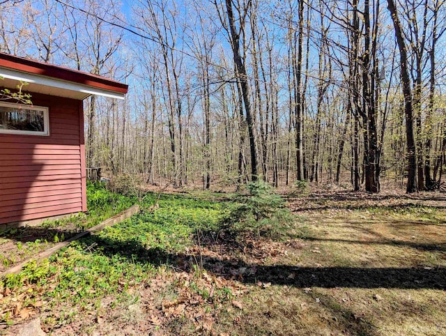 1002 Allouez Rd, Marquette, MI 49855 - view of yard featuring a wooded view