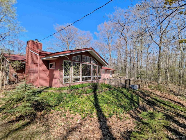 1002 Allouez Rd, Marquette, MI 49855 - back of house with a chimney