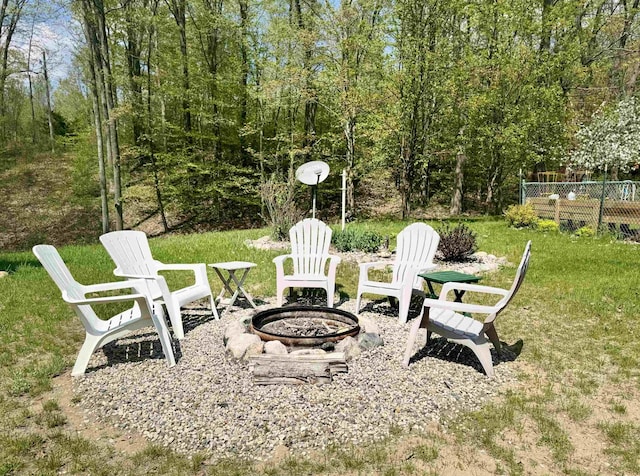 view of yard featuring a fire pit